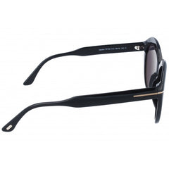 Subtle cat-eye style sunglass comes in a shiny black acetate frame  with a smoked lens.