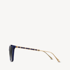 Soft square Aspinal of London sunglass. This lightweight acetate frame comes in a midnight blue colour with grey gradient lenses. Left full view.