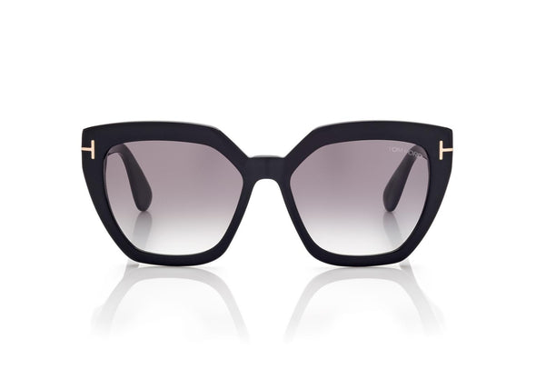 Oversized square acetate style frame in a shiny black with graduated grey lenses and the metal 'T' temple decoration. Front view.