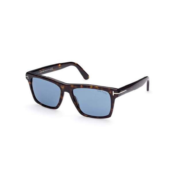 A square acetate frame which comes in a shiny dark havana colour with blue lenses. Left side view.