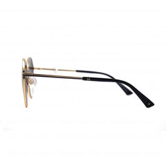 Squared oval shape Ana Hickmann sunglass, with gold metal frame, gold metal bridge, black acetate ends and grey graduated lens. Left side view.
